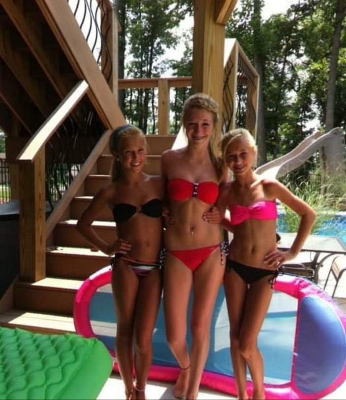 Amber&Hannah with friend swimming in my pool.jpg